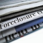 Newspaper with Foreclosure visible, Foreclosure crisis